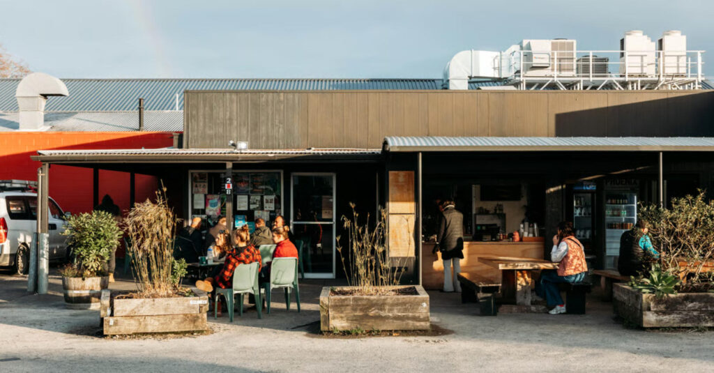 Thriving Gisborne Winery Attracting Customers Through Local SEO Strategy Busy Gisborne winery cellar door with customers enjoying wine tasting, example of local business success through effective Gisborne SEO and digital marketing