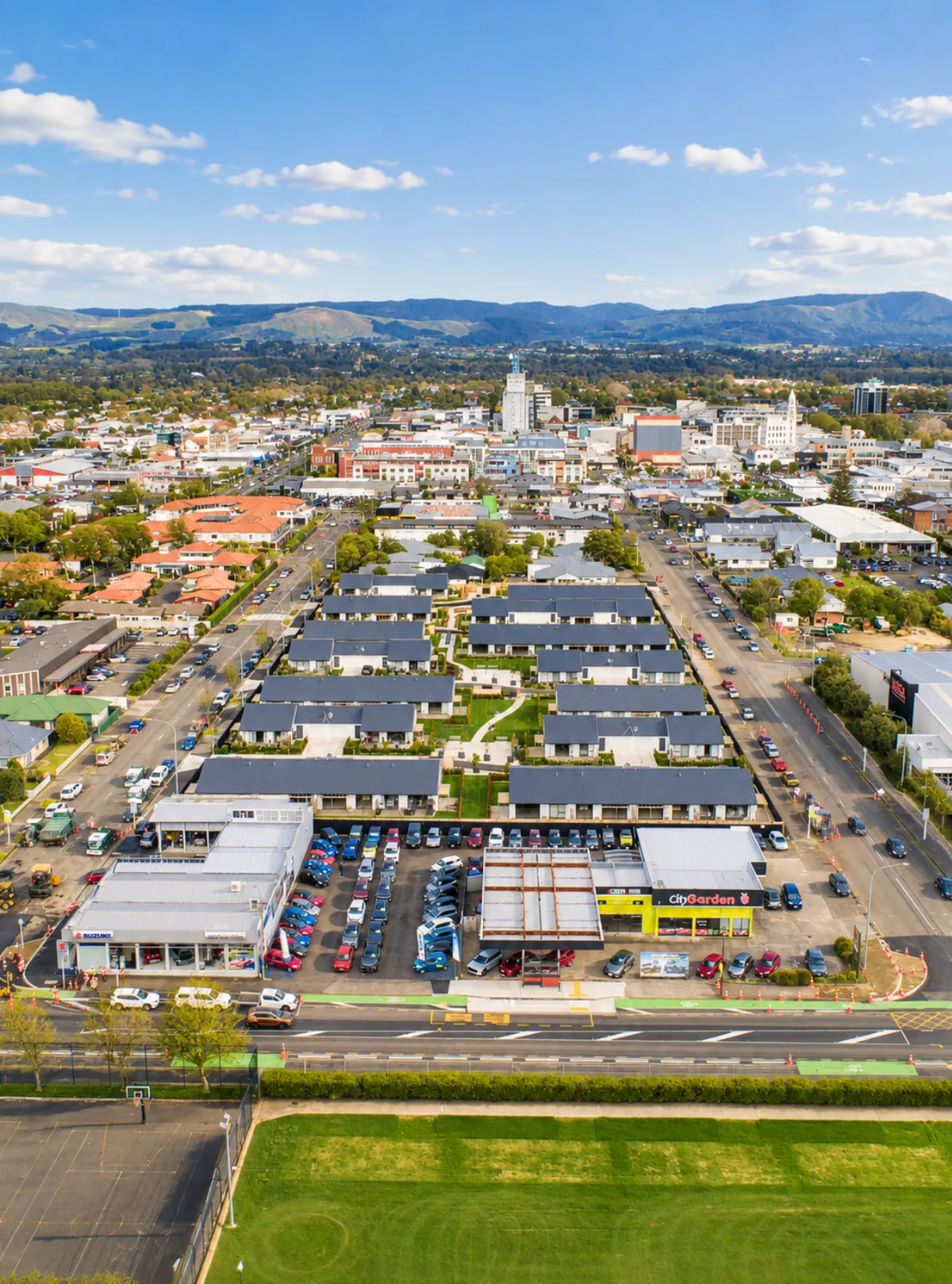 Aerial view over Palmerston North towards the city centre and the Tararua Range